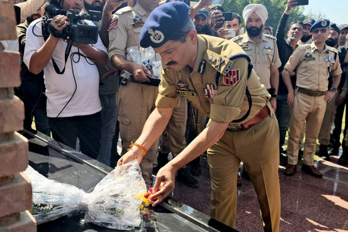 J&K DGP R R Swain paying tribute to martyrs at Balidan Stambh 